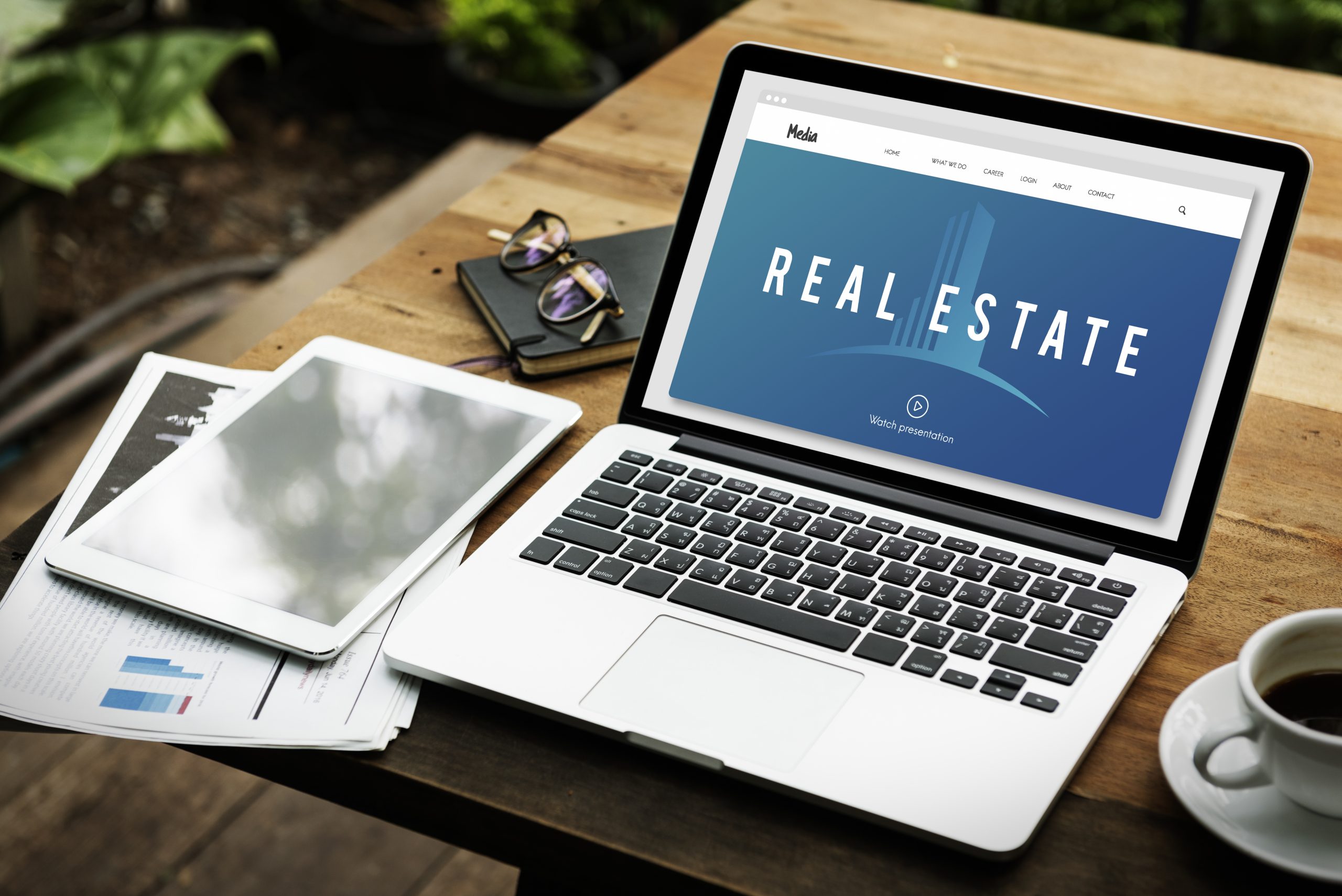 Laptop displaying real estate website
